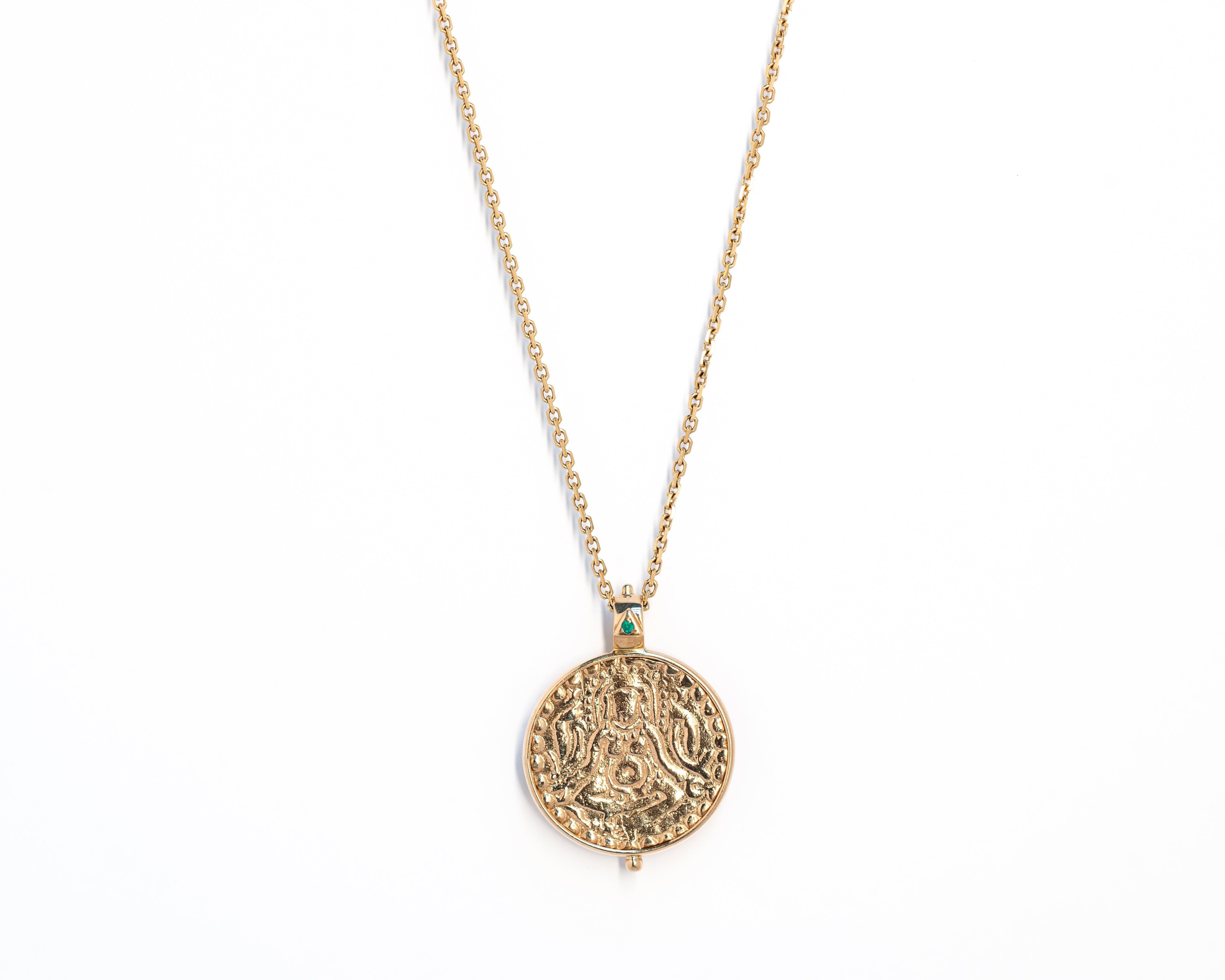Gold coin necklace with inlayed emerald in 18k yellow gold