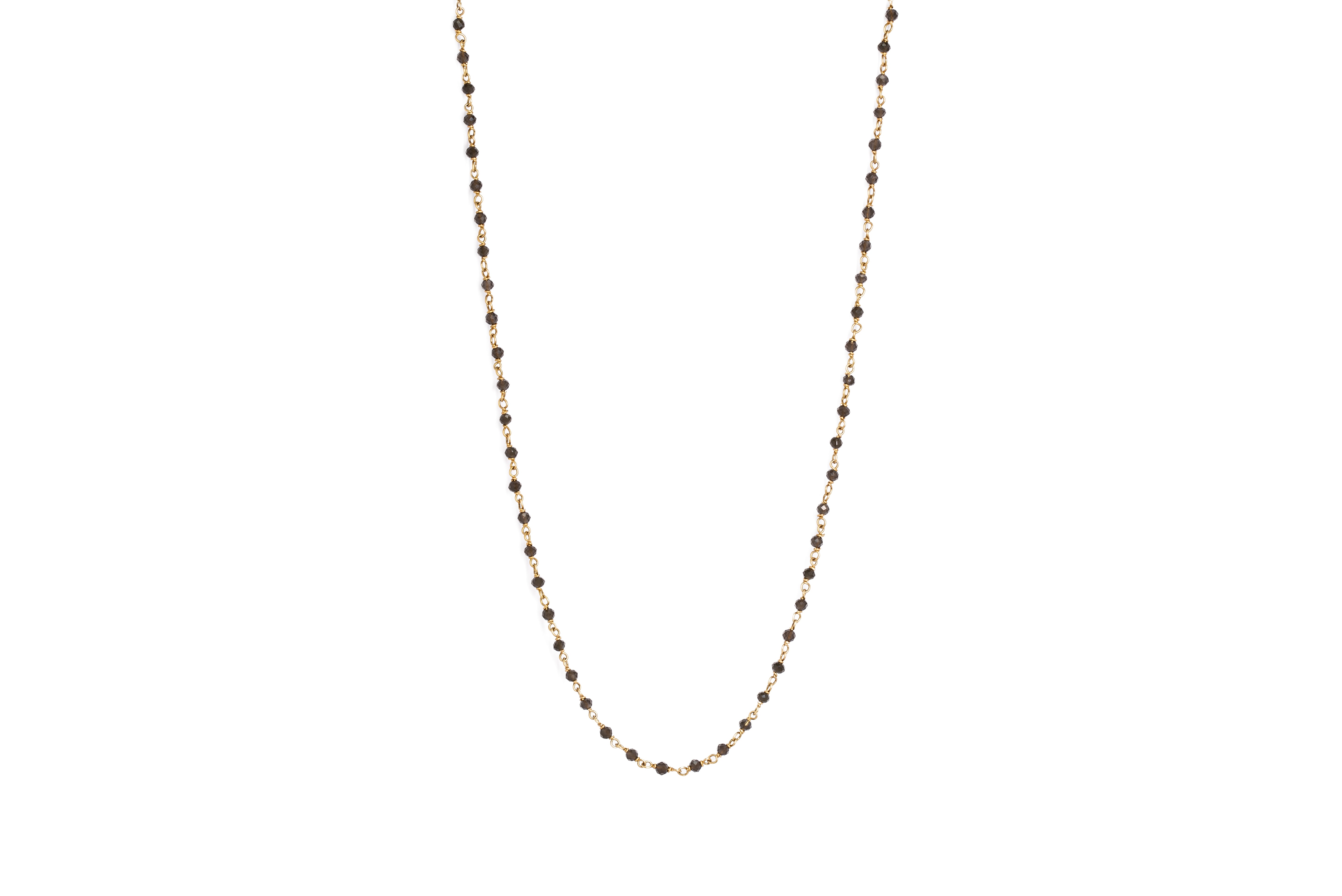 A Black Tourmaline Mala Necklace with small black beads and gold accents, displayed against a white background.