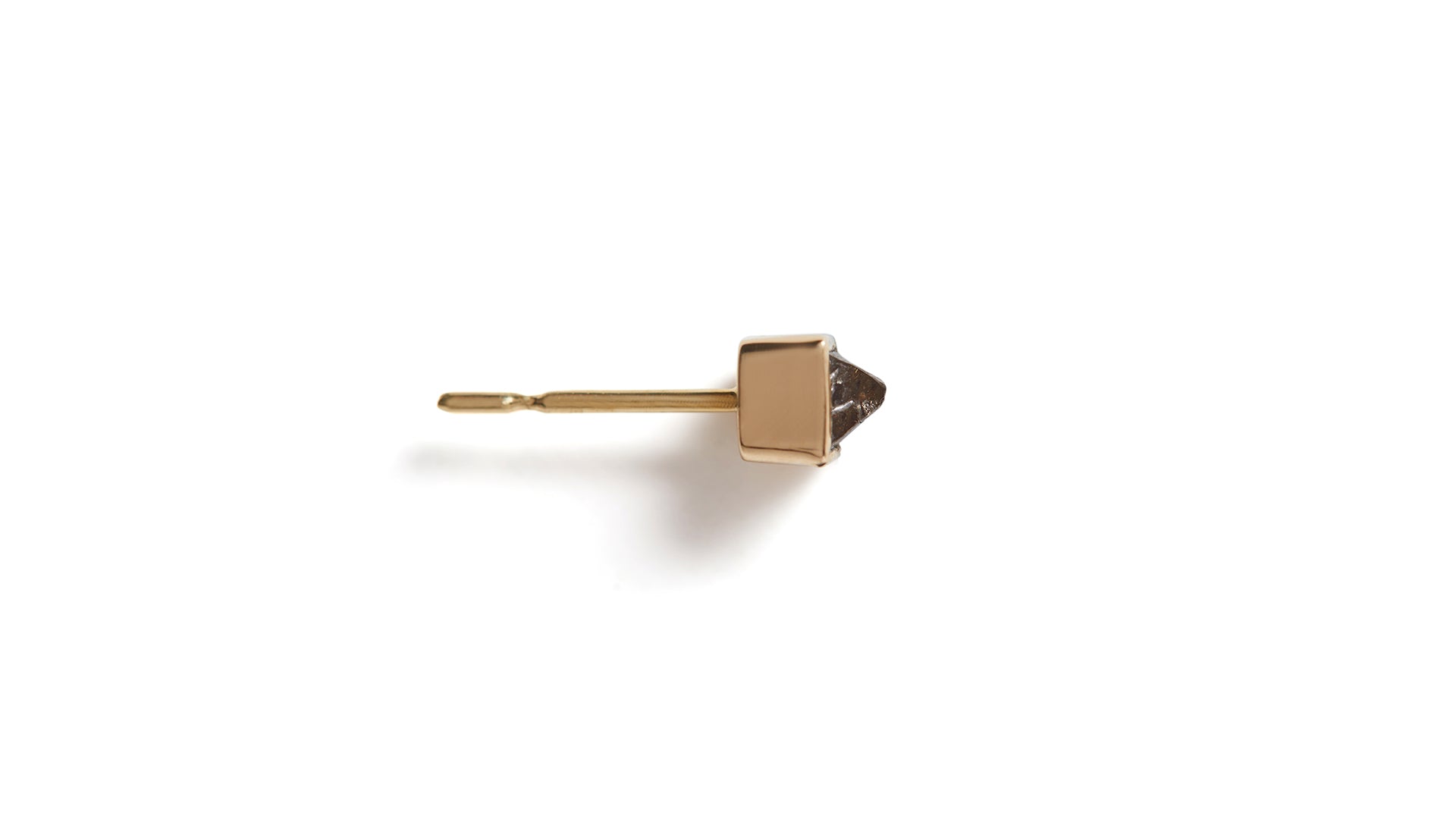 A single earring featuring an 18ct gold post with a raw diamond crystal attached, against a white background.